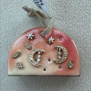 Free People Gold Moon & Star Earrings Set on Pink Gradient Card